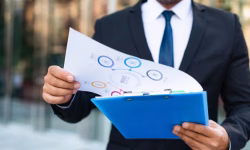 front-view-business-man-looking-charts_23-2148763828